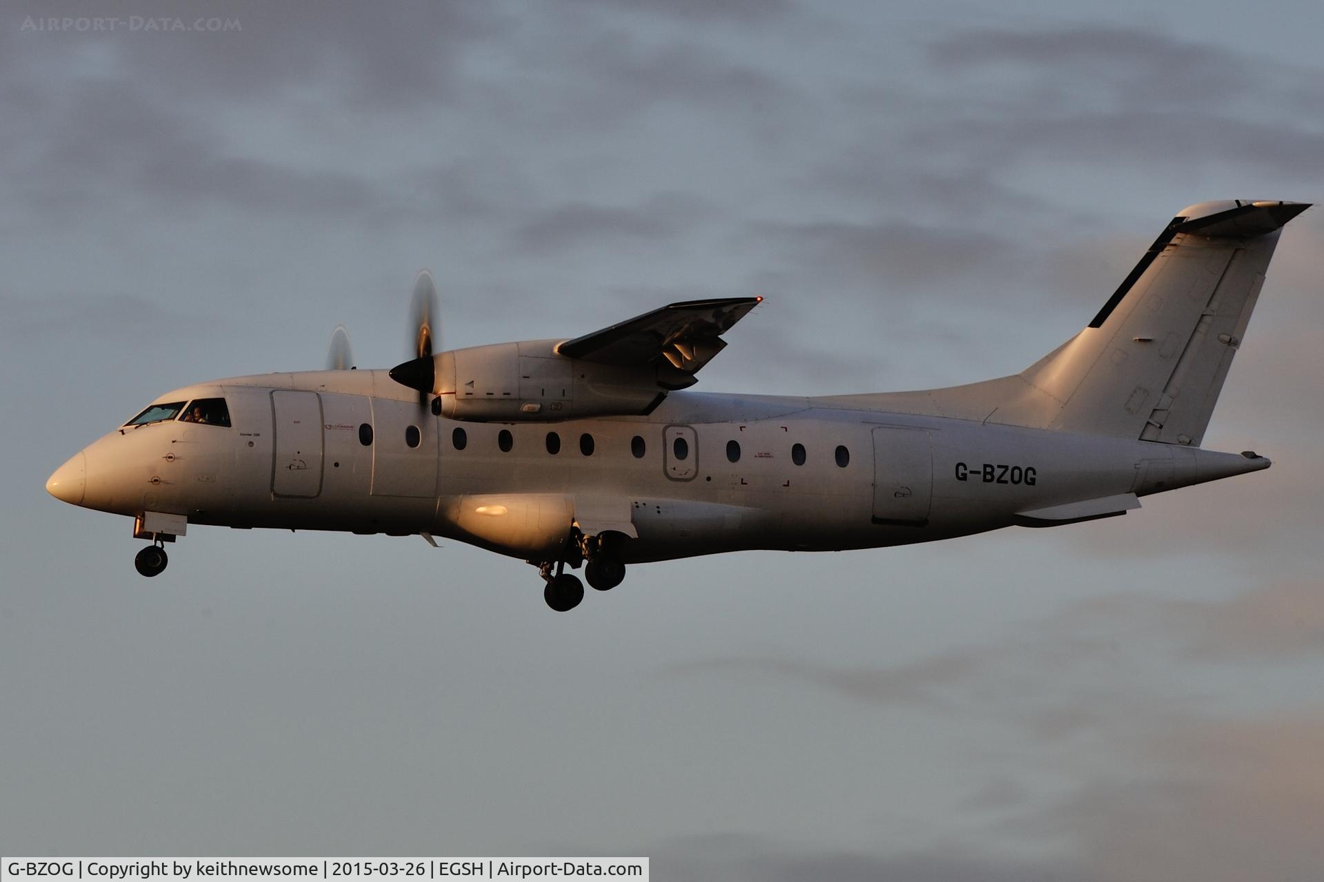 G-BZOG, 1998 Dornier 328-100 C/N 3088, Late evening landing.