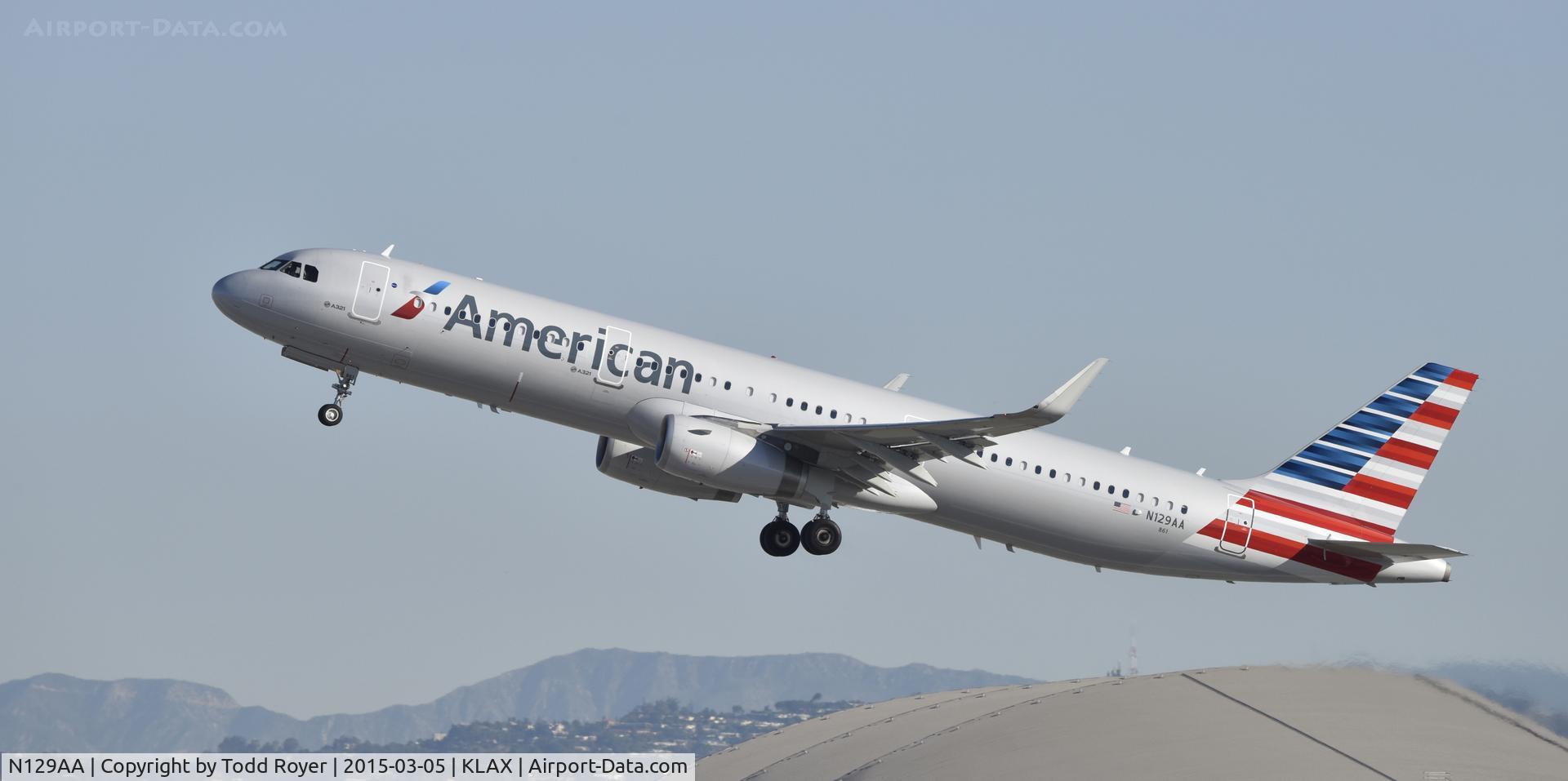 N129AA, 2014 Airbus A321-231 C/N 6401, Departing LAX on 25R