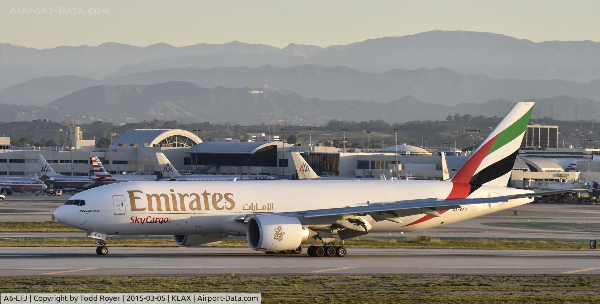 A6-EFJ, 2012 Boeing 777-F1H C/N 35610, Arriving at LAX on 25L