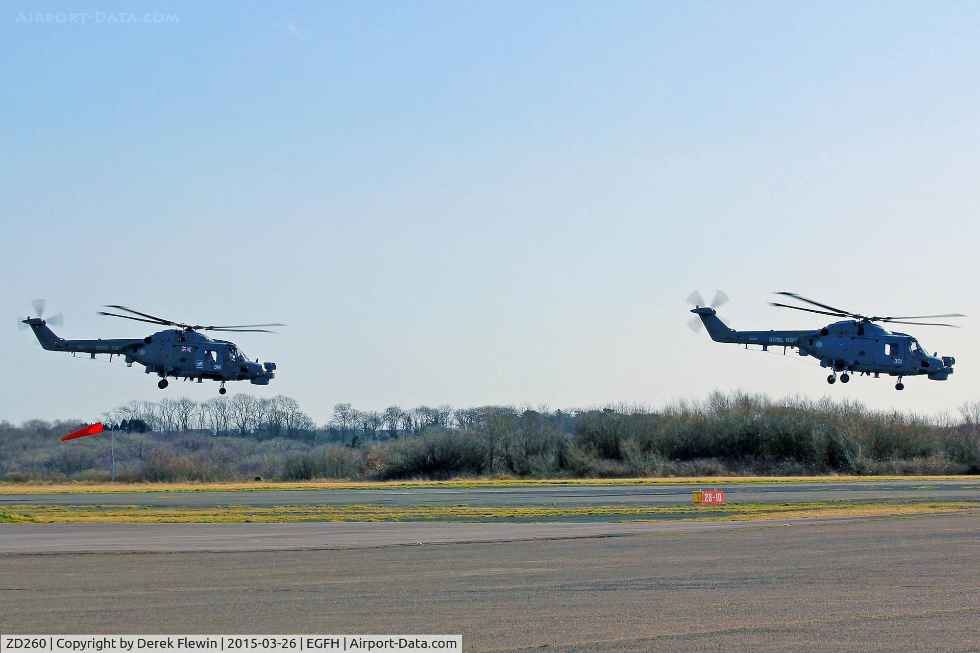 ZD260, 1983 Westland Lynx HAS.8DSP C/N 292, Visiting Royal Navy Lynx, coded 301, Rascal Flight, 815 NAS, RNAS Yeovilton based, leading ZD261, seen hover taxxing prior to departing to RTB, following a refuel,