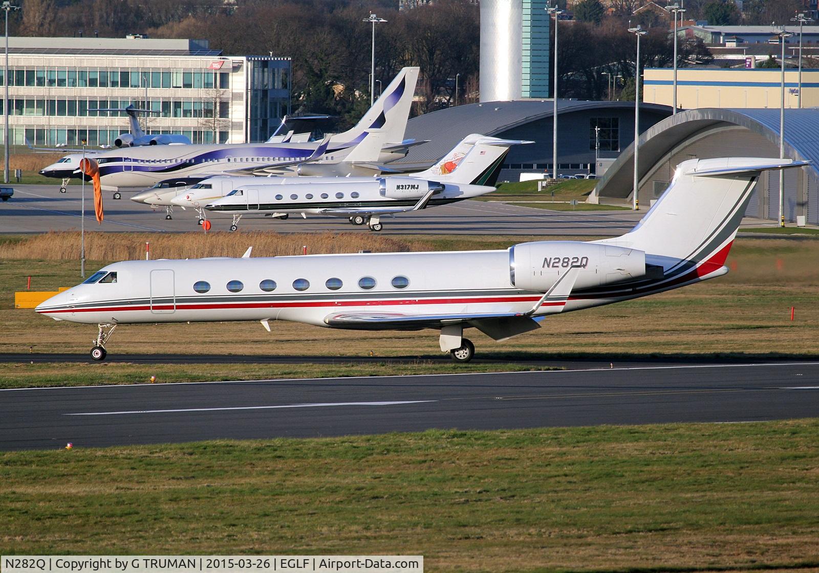 N282Q, 2005 Gulfstream Aerospace GV-SP (G550) C/N 5090, Evening arrival taxying off runway 24