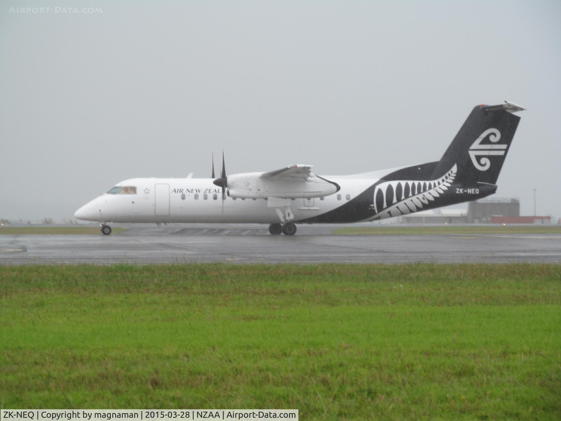 ZK-NEQ, 2007 De Havilland Canada DHC-8-311 Dash 8 C/N 636, new c/s in the rain at AKL