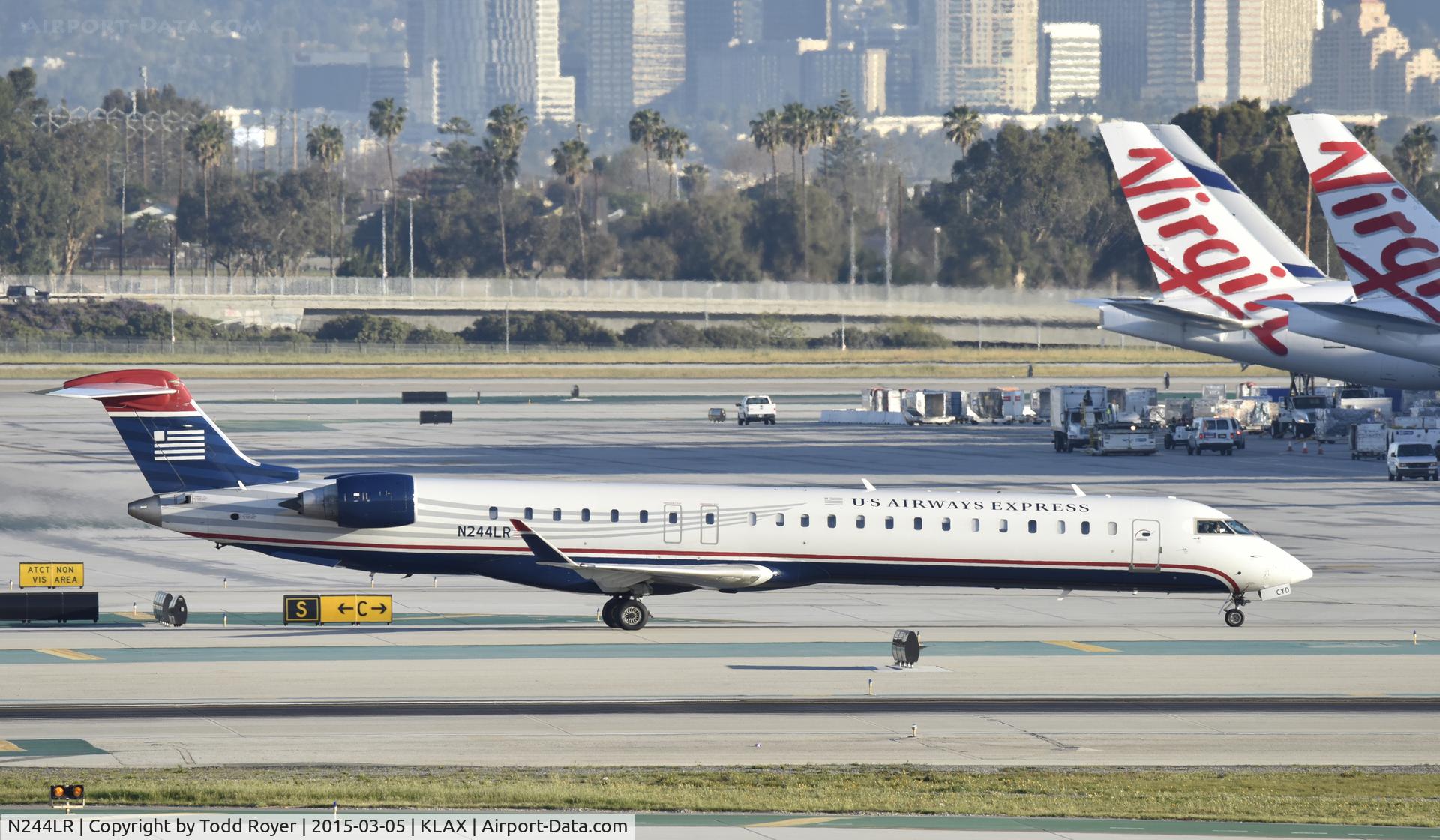 N244LR, 2009 Bombardier CRJ-900LR (CL-600-2D24) C/N 15233, Taxiing to gate at LAX