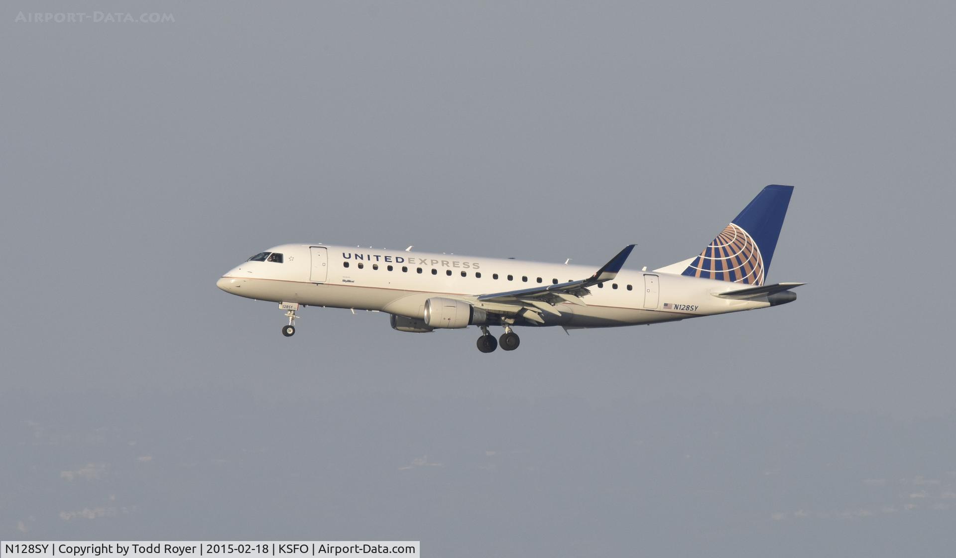 N128SY, 2014 Embraer 175LR (ERJ-170-200LR) C/N 17000445, Landing at SFO