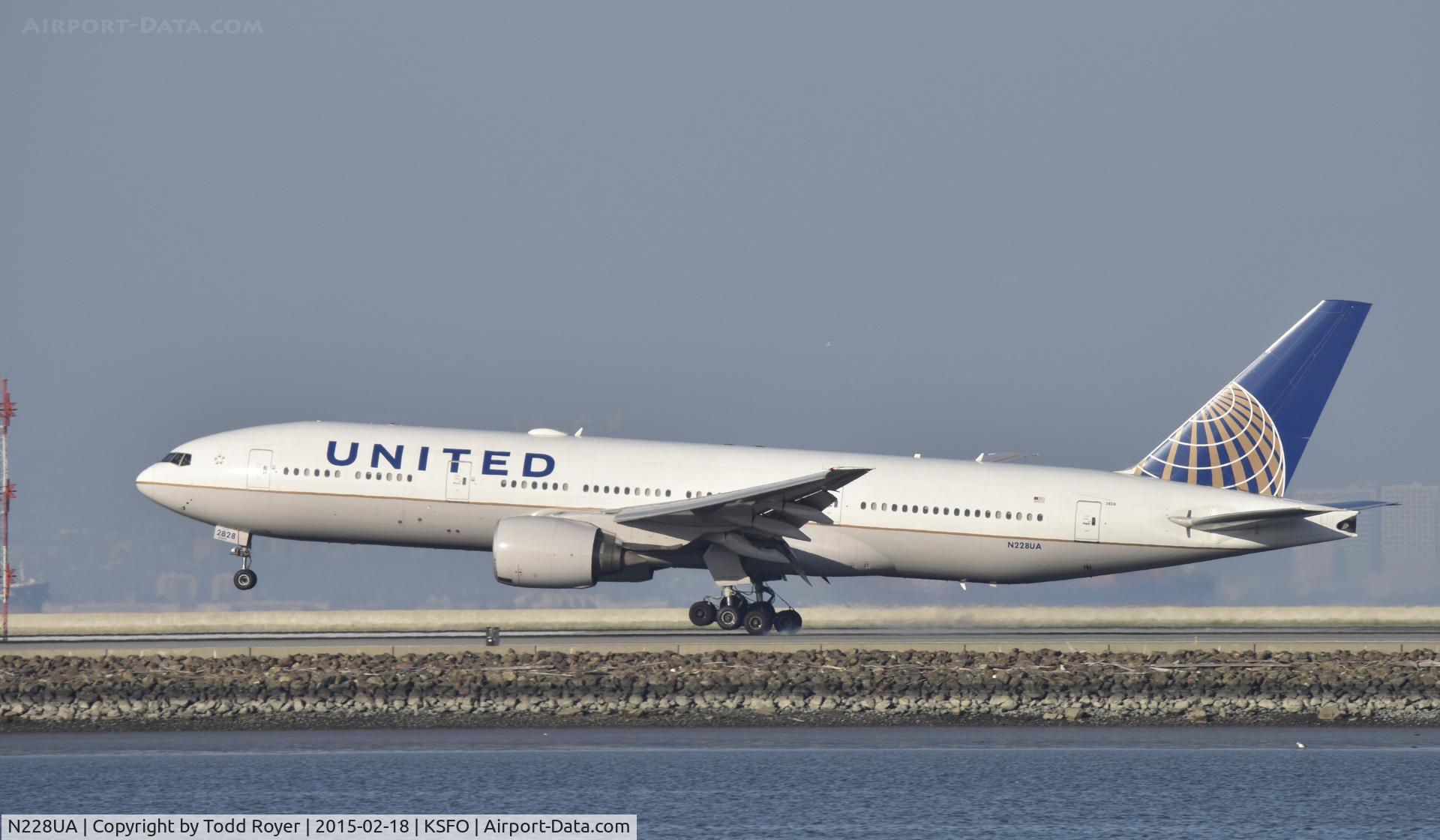 N228UA, 2002 Boeing 777-222 C/N 30556, Landing at SFO