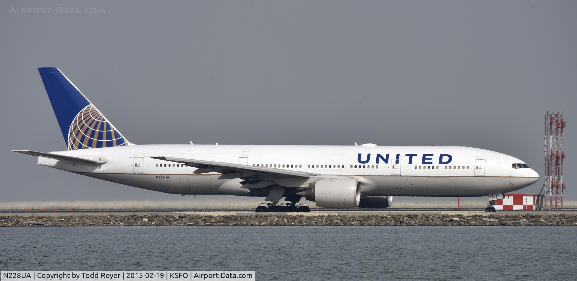 N228UA, 2002 Boeing 777-222 C/N 30556, Taxiing to gate at SFO