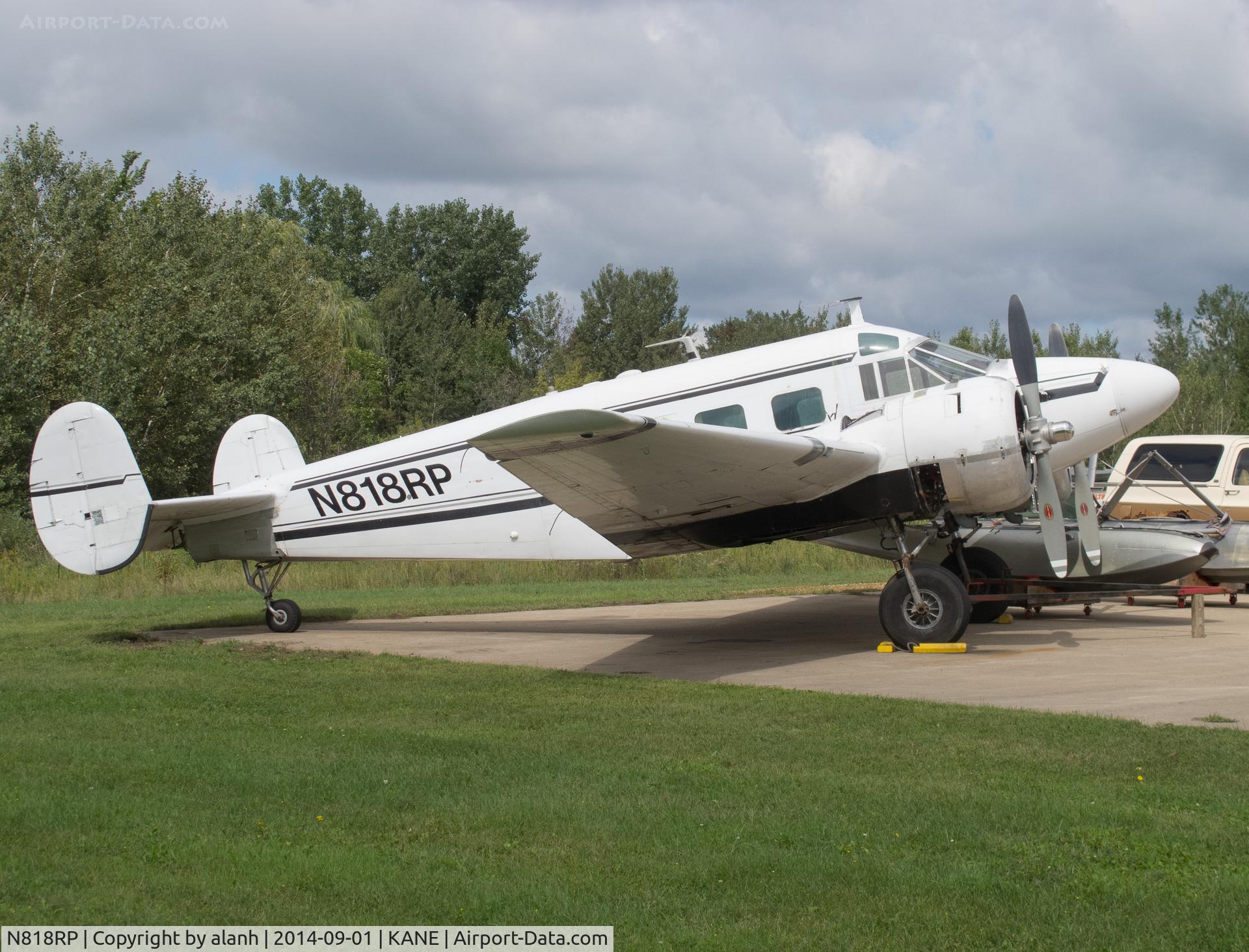 N818RP, 1956 Beech E18S C/N BA-175, Parked up among the hangars