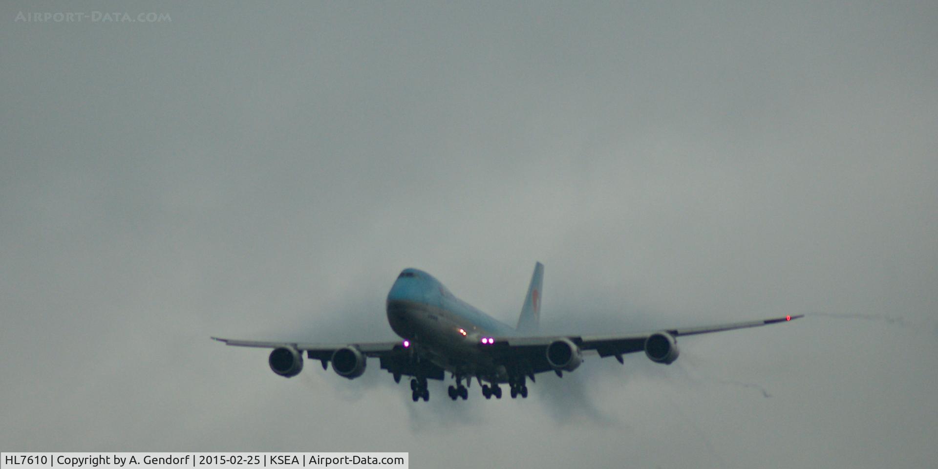 HL7610, 2012 Boeing 747-8HT/F C/N 37133, Korean Air Cargo, is here breaking through the rainclouds at Seattle-Tacoma Int'l(KSEA)