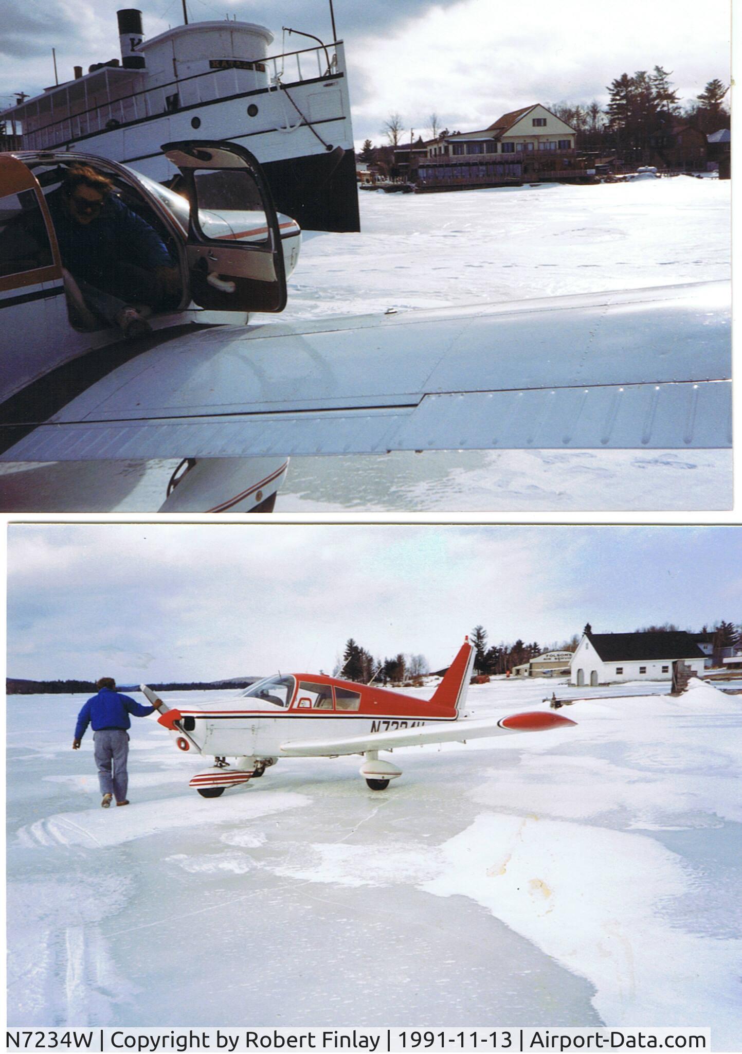 N7234W, 1963 Piper PA-28-180 C/N 28-1053, 1991 Landing on Moosehead Lake, ice, no snow yet.