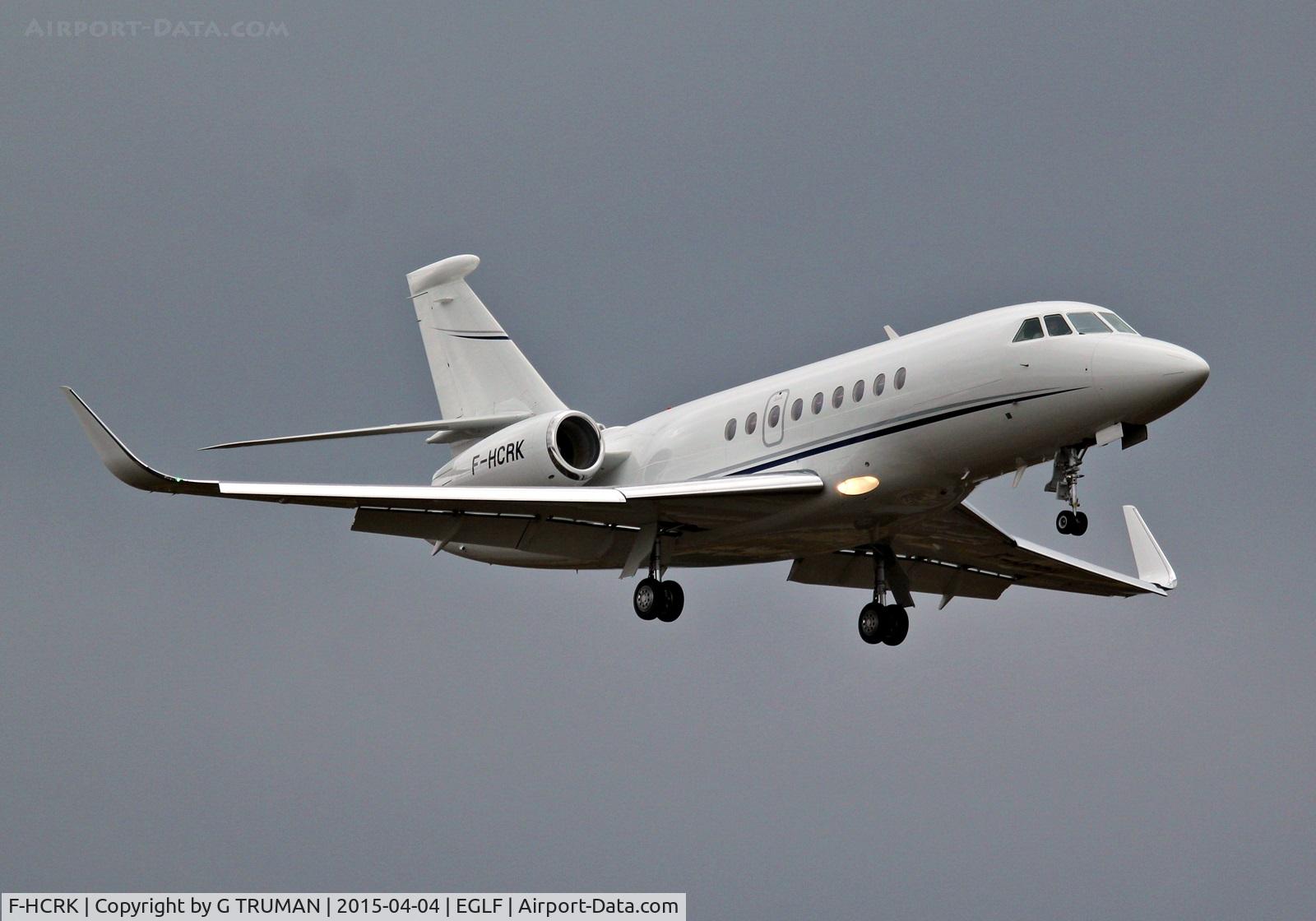 F-HCRK, Dassault Falcon 2000S C/N 707, Final approach into Farnborough runway 06 on a dark grey day