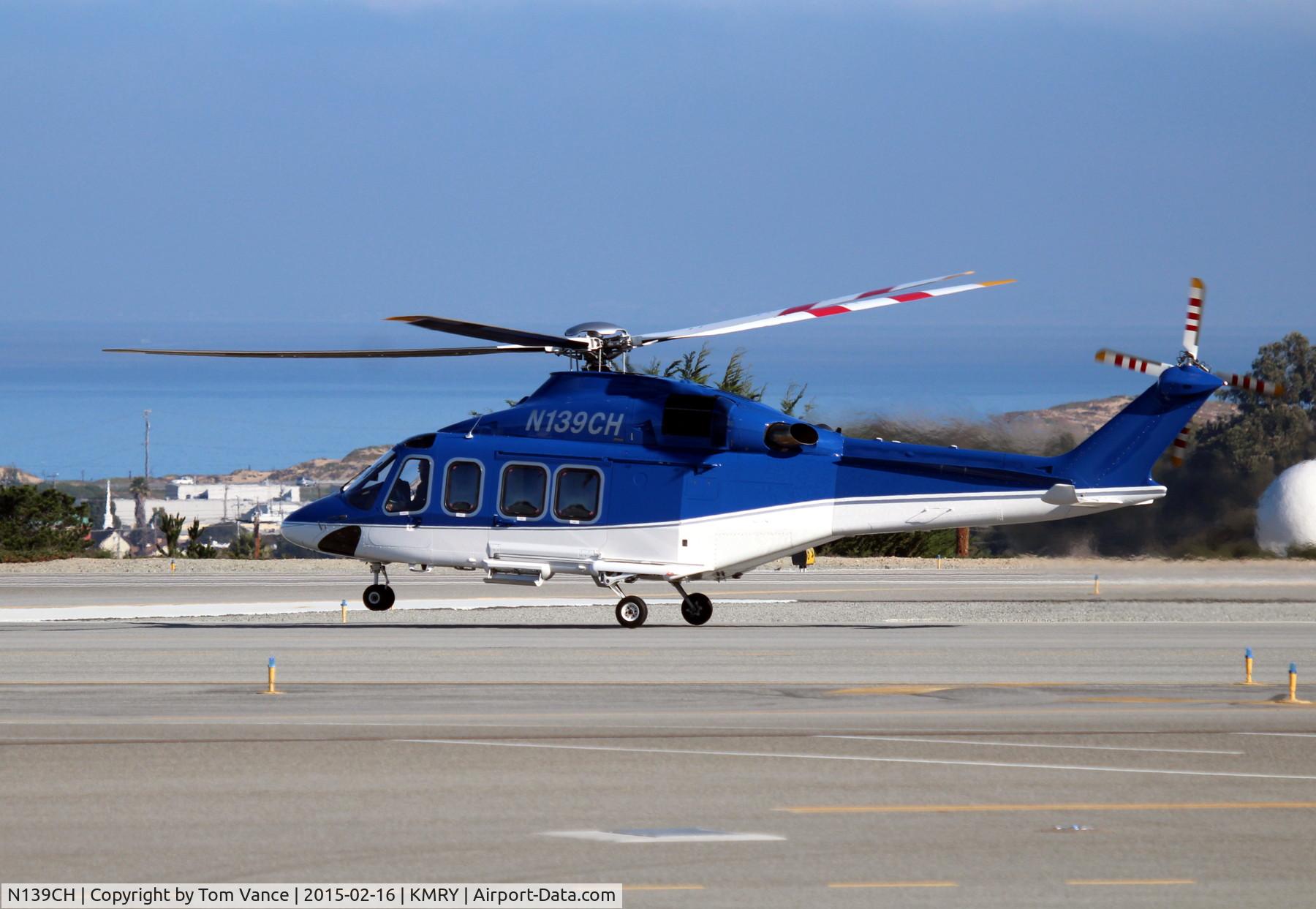 N139CH, 2006 AgustaWestland AW-139 C/N 31063, N139CH lift of at the west end of Runway 28 at Monterey, CA