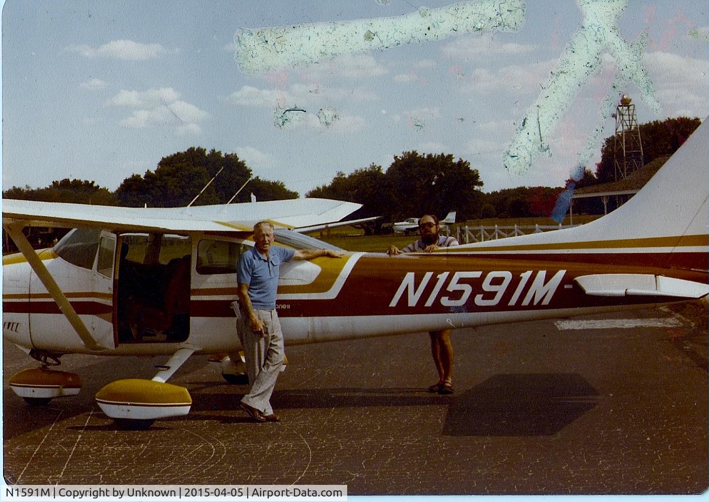 N1591M, Cessna 182P Skylane C/N 18264381, At one time, this beautiful plane was owned by my Grandfather (on left).  When I saw that there were no pictures, I searched through a life time of photo albums and found these two.  I hope they are accepted!
