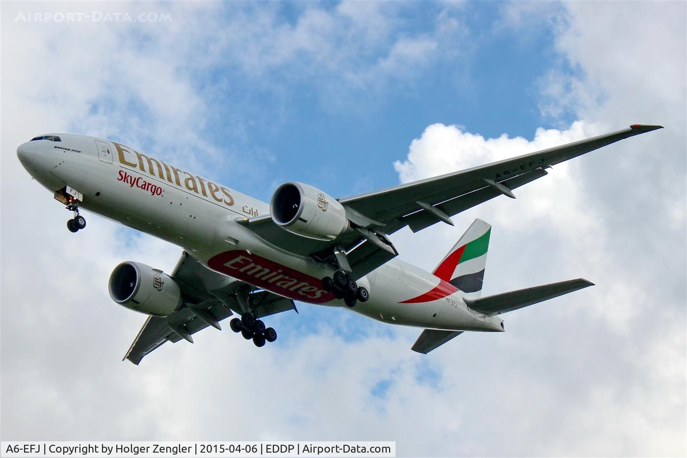 A6-EFJ, 2012 Boeing 777-F1H C/N 35610, Sundays surprise is floating down to rwy 26L...