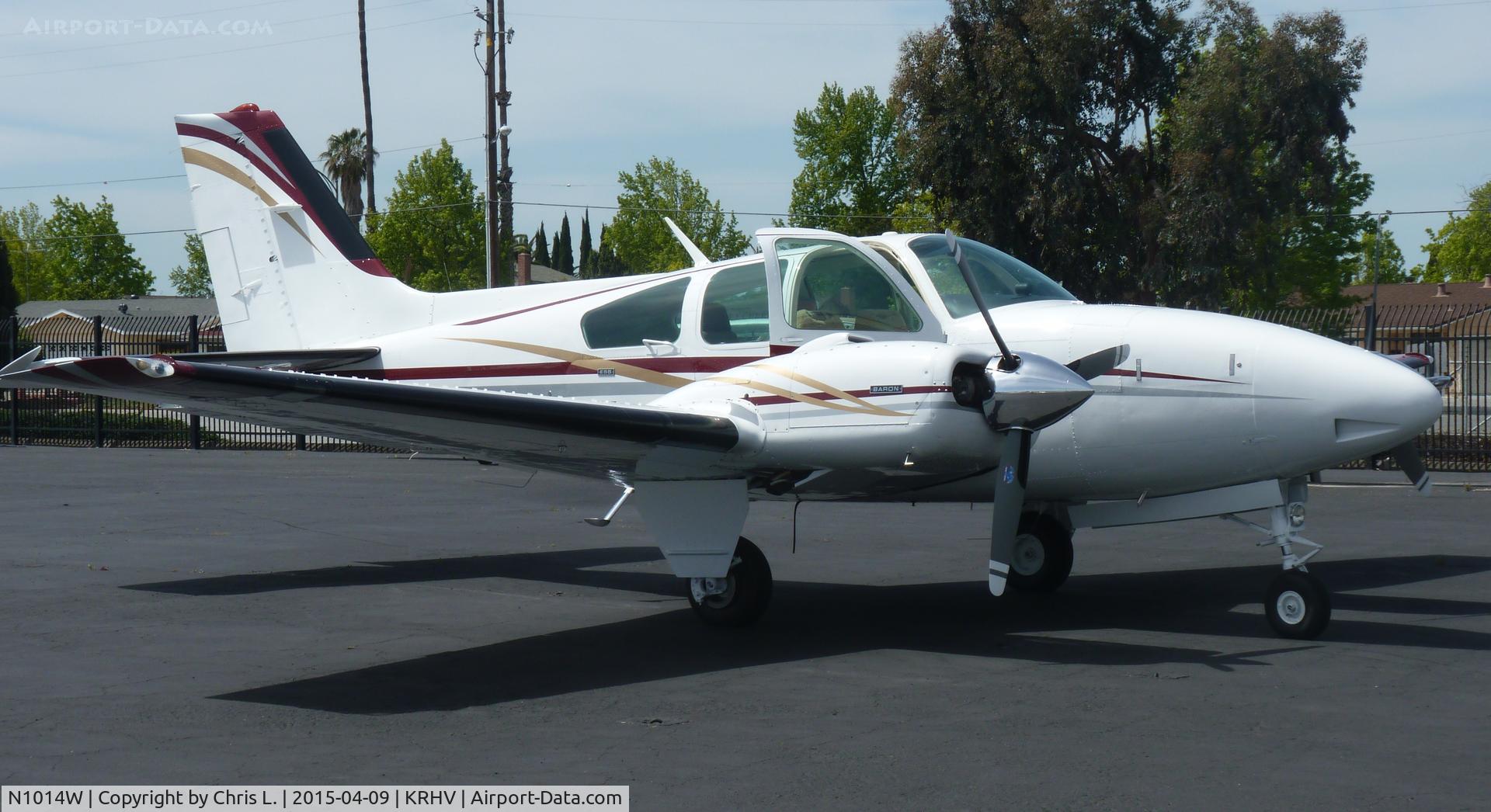 N1014W, 1973 Beech E-55 Baron C/N TE-906, A local 1973 Beechcraft Baron 55 sitting in front of the Lafferty Aircraft Sales hangar.