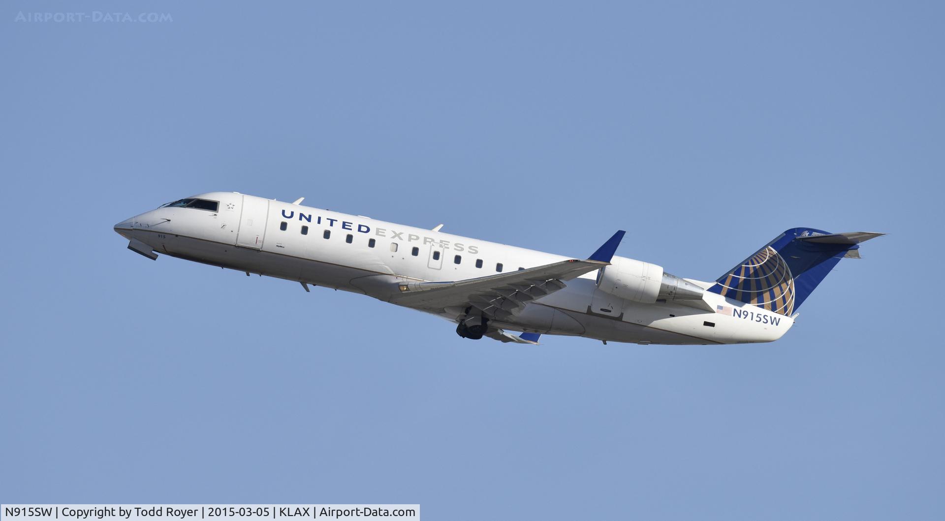 N915SW, 2002 Bombardier CRJ-200LR (CL-600-2B19) C/N 7615, Departing LAX on 25R