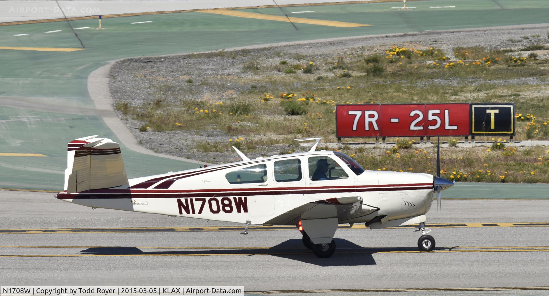 N1708W, 1964 Beech S35 Bonanza C/N D-7340, Taxiing to parking at LAX