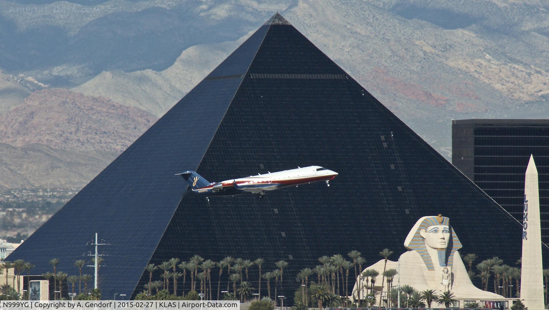N999YG, 1995 Canadair CRJ-100SE (CL-600-2B19) C/N 7075, Private, is here leaving Las Vegas Int'l(KLAS) in front of the Luxor Hotel