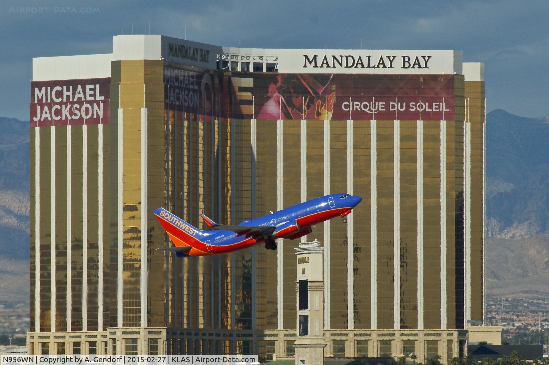 N956WN, 2011 Boeing 737-7H4 C/N 36672, Southwest Airlines, seen here passing by the Mandalay Bay Casino & Resort during take off at Las Vegas Int'l(KLAS)