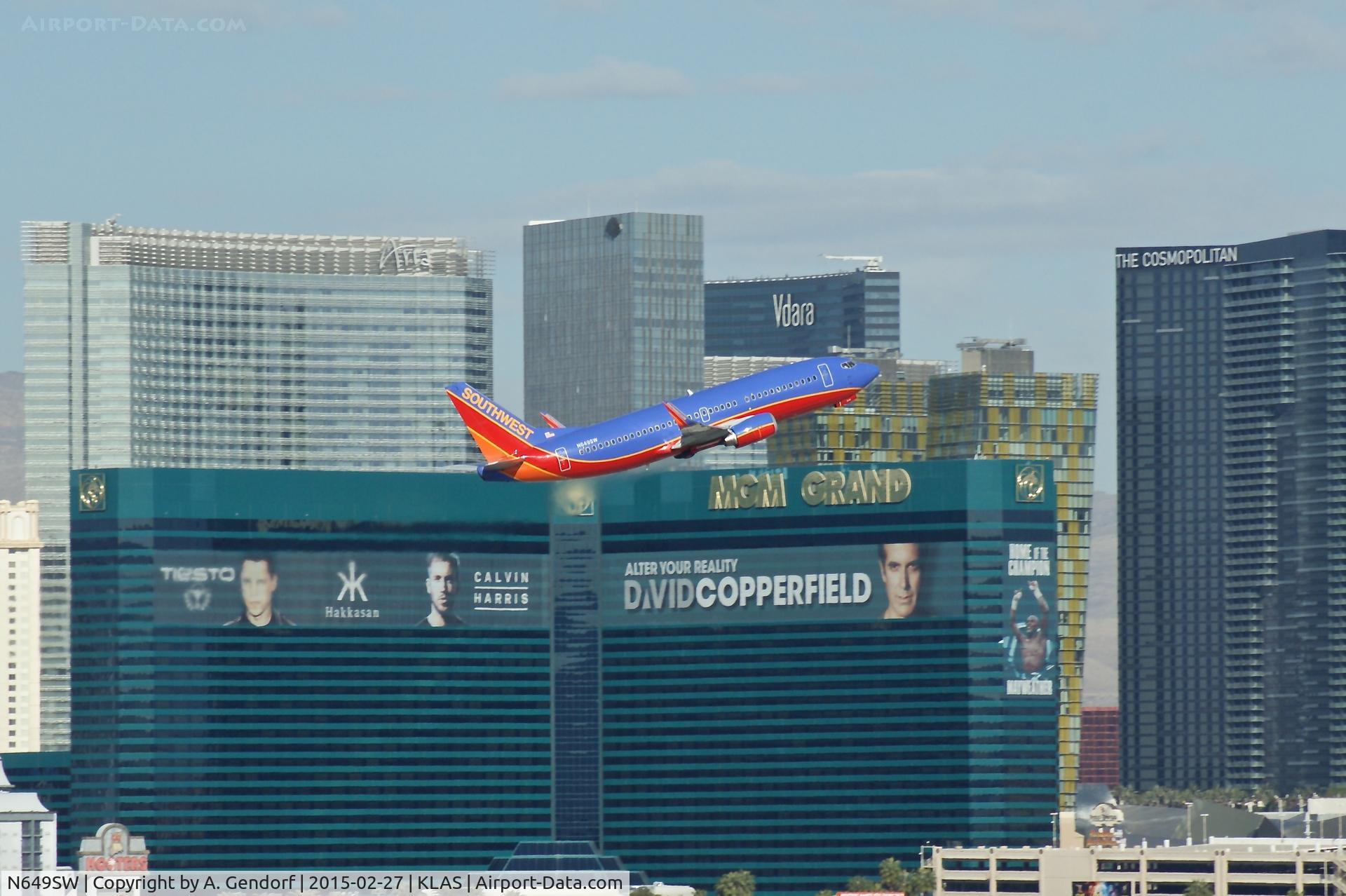 N649SW, 1997 Boeing 737-3H4 C/N 27719, Southwest Airlines, is here passing the MGM Grand Hotel during take off climb at Las Vegas(KLAS)