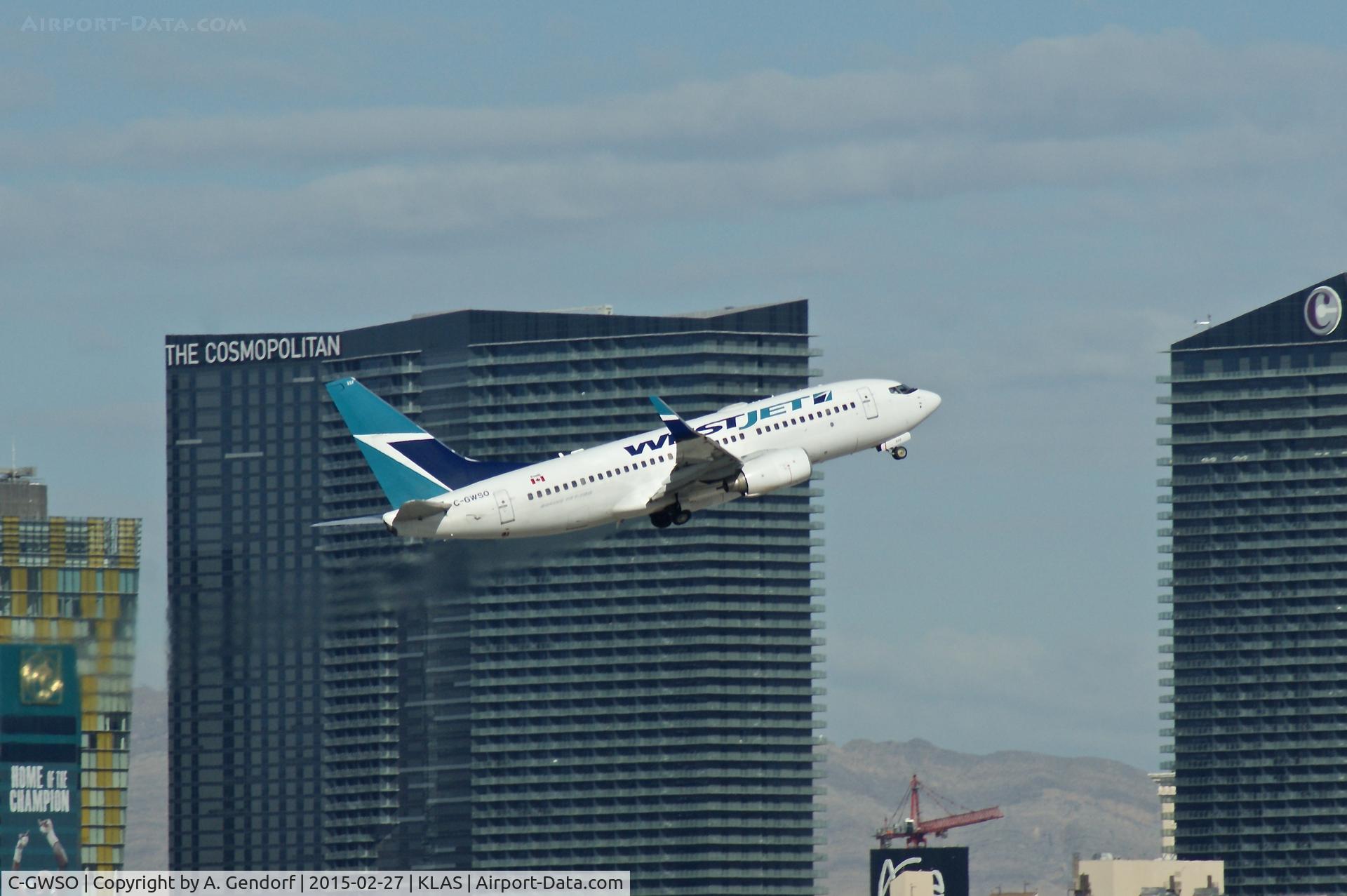 C-GWSO, 2009 Boeing 737-7CT C/N 37090, WestJet Airlines, is here climbing out Las Vegas Int'l(KLAS) with the Cosmopolitan Hotel in the background