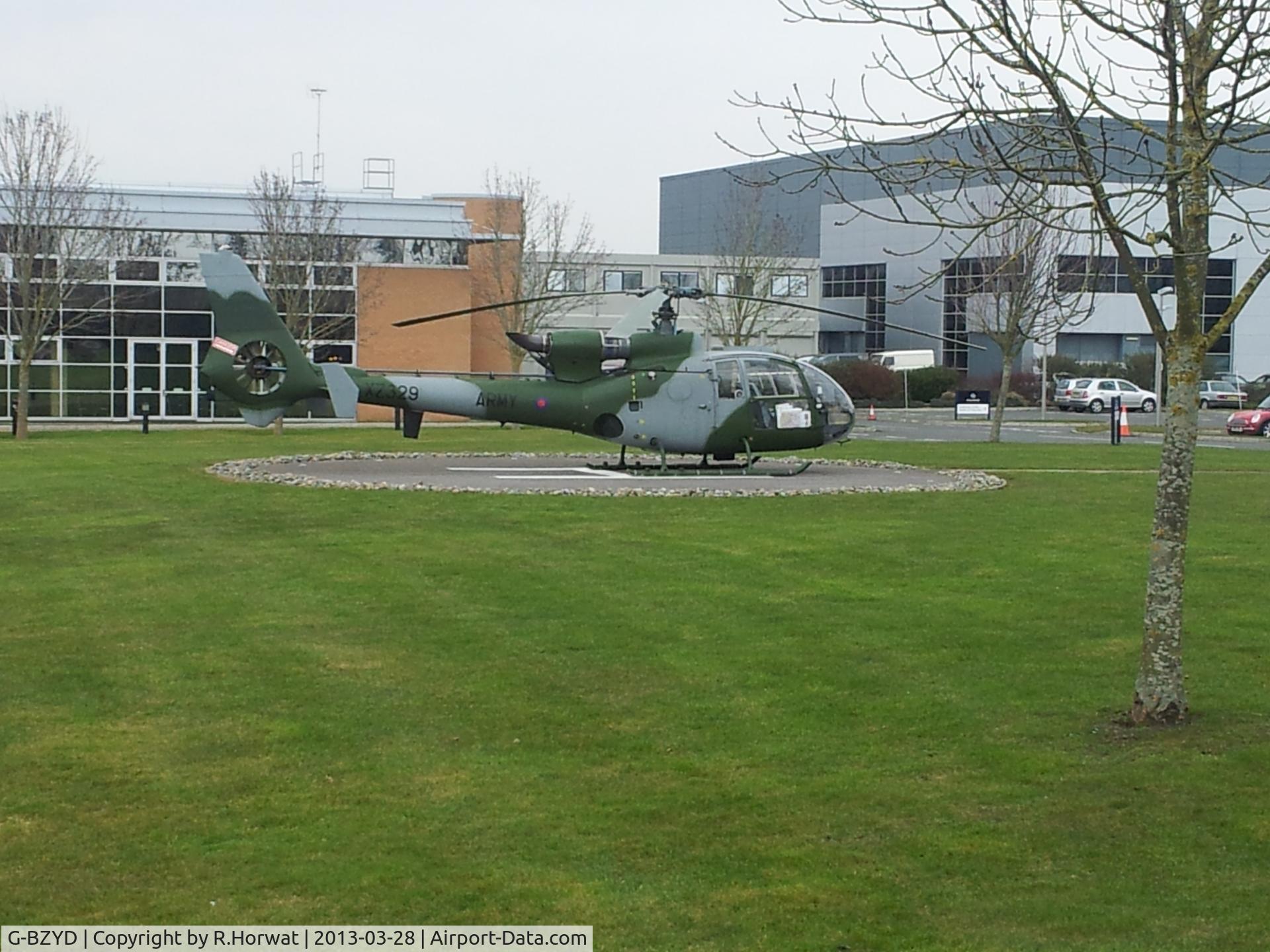 G-BZYD, 1977 Westland SA-341B Gazelle AH1 C/N 1648, On the helipad outside the Williams conference centre Grove Oxfordshire 2013.