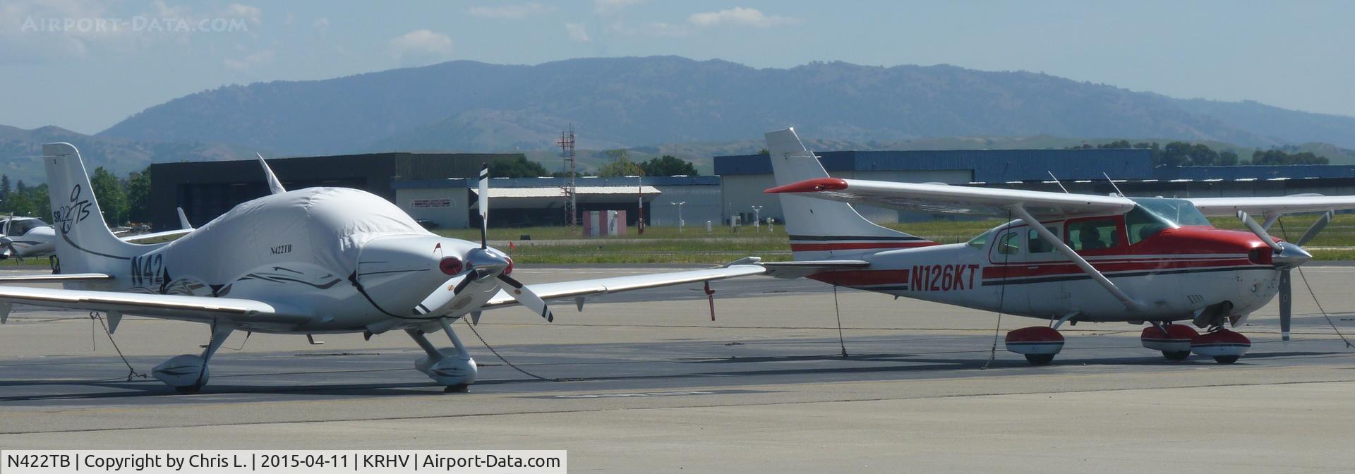 N422TB, 2006 Cirrus SR22 GTS C/N 1888, A transient 2006 Cirrus SR22 with a transient Cessna T206 next to it.