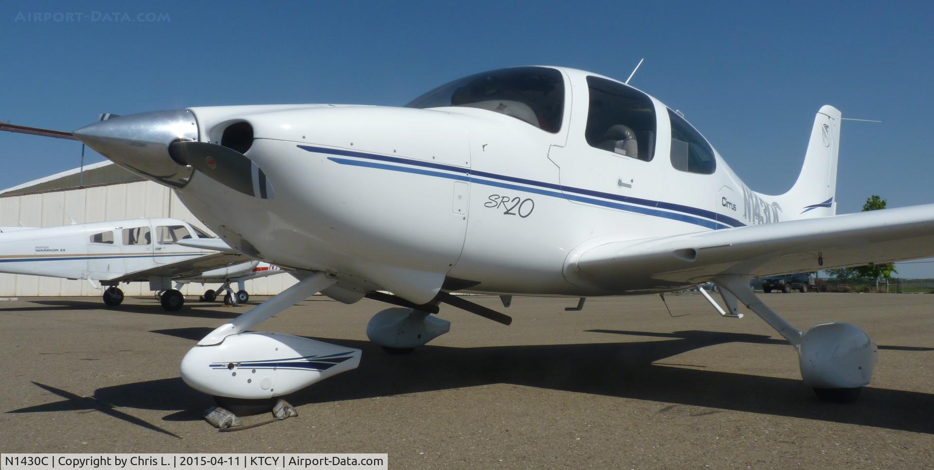 N1430C, 2003 Cirrus SR20 C/N 1326, A nice 2003 Cirrus SR20 sitting on the ramp at Tracy Municipal Airport.