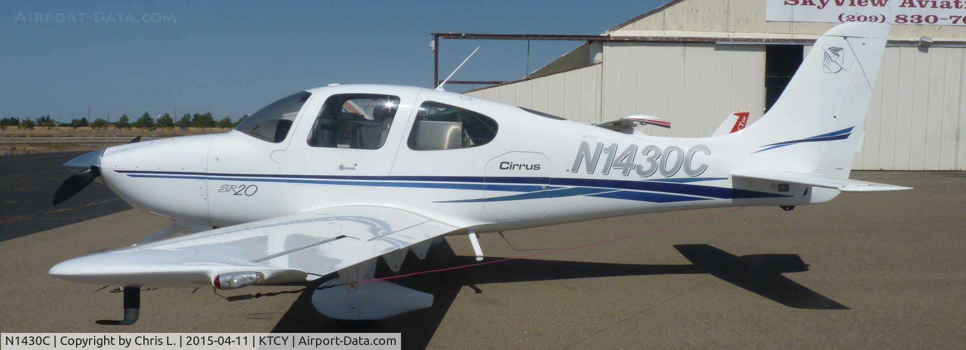 N1430C, 2003 Cirrus SR20 C/N 1326, A nice 2003 Cirrus SR20 sitting on the ramp at Tracy Municipal Airport.