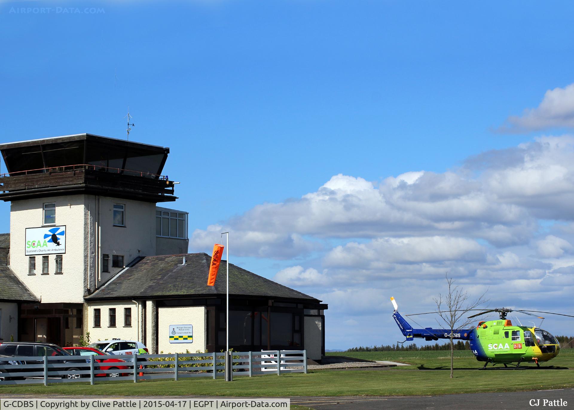 G-CDBS, 1985 MBB Bo.105DBS-4 C/N S.738, Pictured on the grass dispersal outside the tower at Perth EGPT