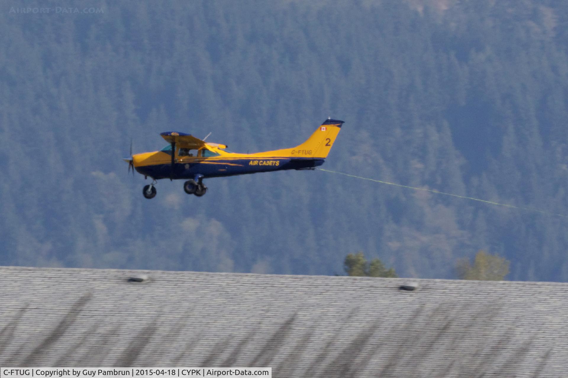 C-FTUG, 1975 Cessna 182P Skylane C/N 18263875, Landing after pulling a glider up