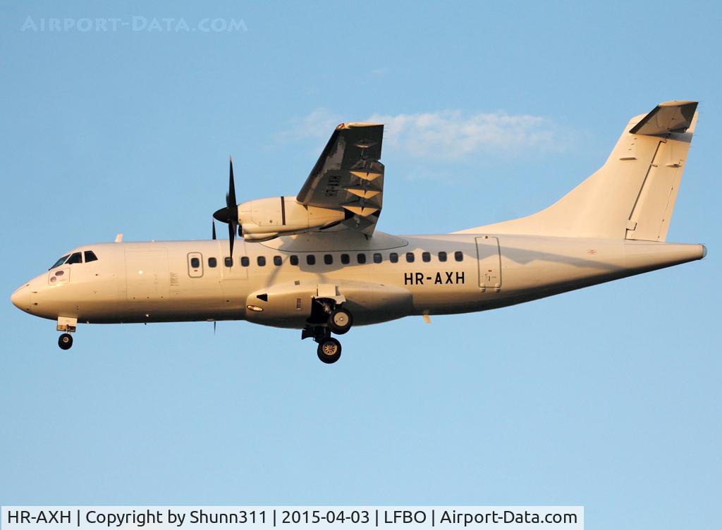 HR-AXH, 1992 ATR 42-300 C/N 291, Landing rwy 32L in all white c/s without titles... Returned to lessor and stored @ LFBO
