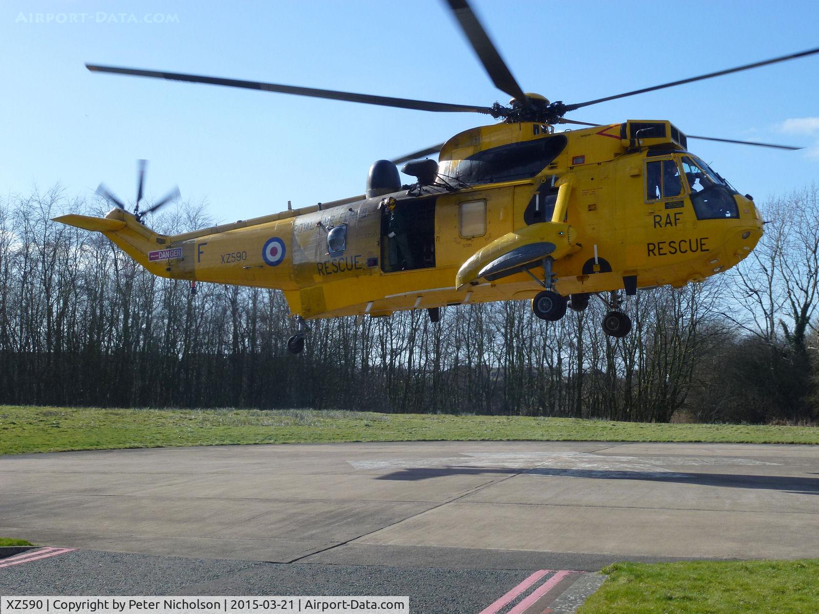 XZ590, 1977 Westland Sea King HAR.3 C/N WA856, Sea King HAR.3 of 202 Squadron  at RAF Boulmer departing the Cumberland Infirmary in March 2015.