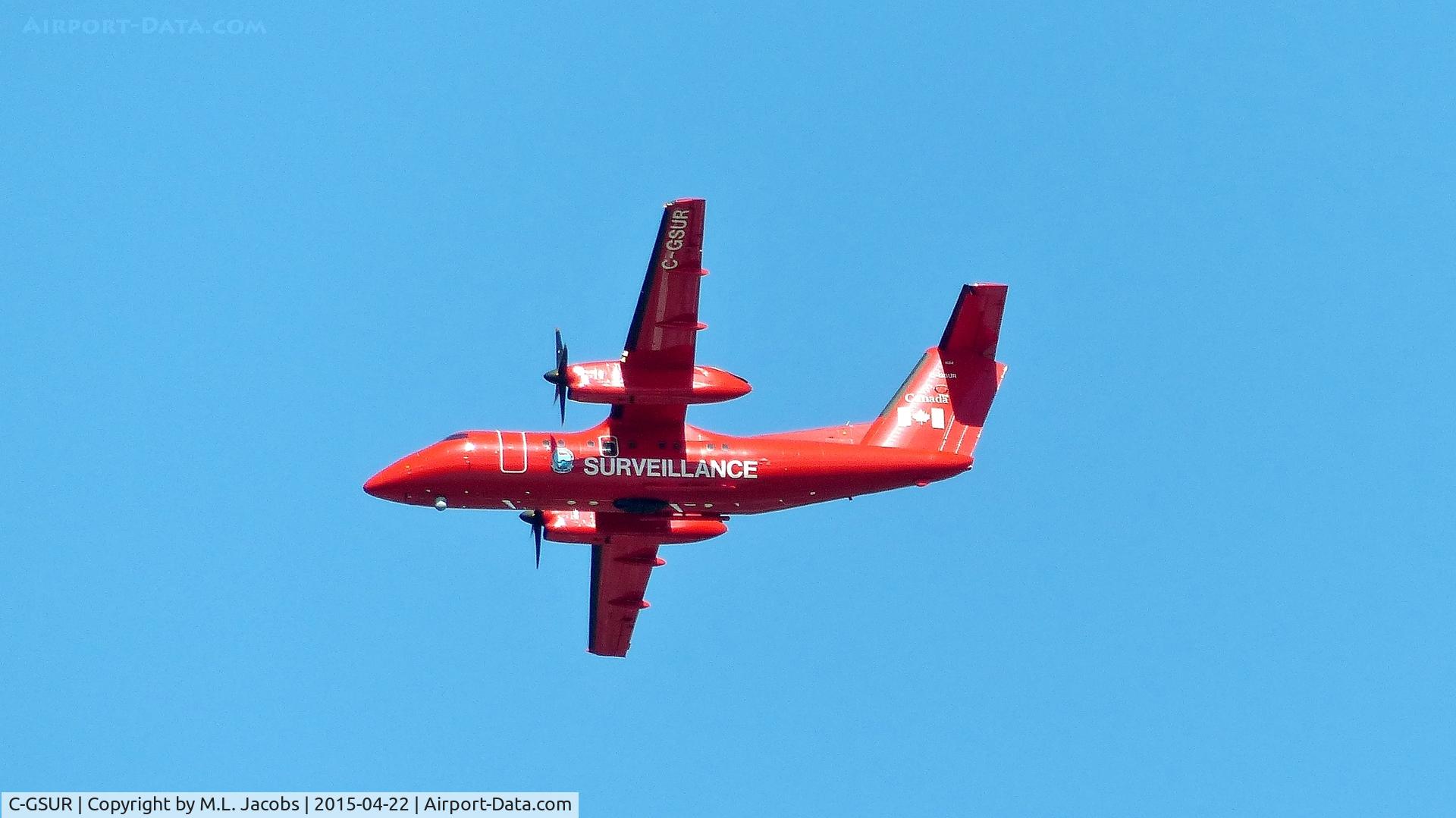 C-GSUR, 1986 De Havilland Canada CC-142 Dash 8 (DHC-8-102) C/N 46, Transport Canada Surveillance Dash 8 flying over Vancouver Harbour. More local activity due to the recent bunker oil spill.