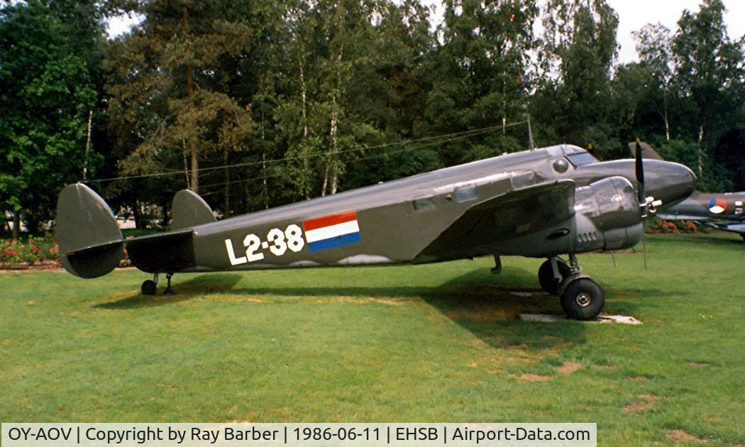OY-AOV, 1941 Lockheed 12A Electra Junior C/N 1306, Lockheed L12A Electra Junior [1306] (Militaire Luchtvaart Museum) Soesterberg~PH 11/06/1986. With marks of L2-38. From a slide