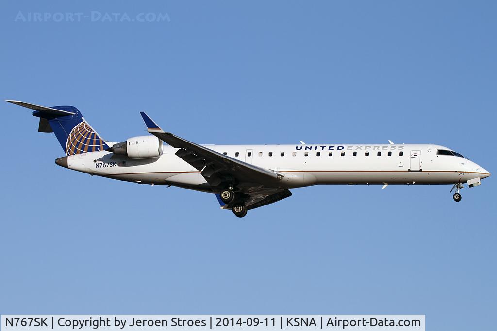 N767SK, 2005 Bombardier CRJ-702 (CL-600-2C10) Regional Jet C/N 10233, on approach