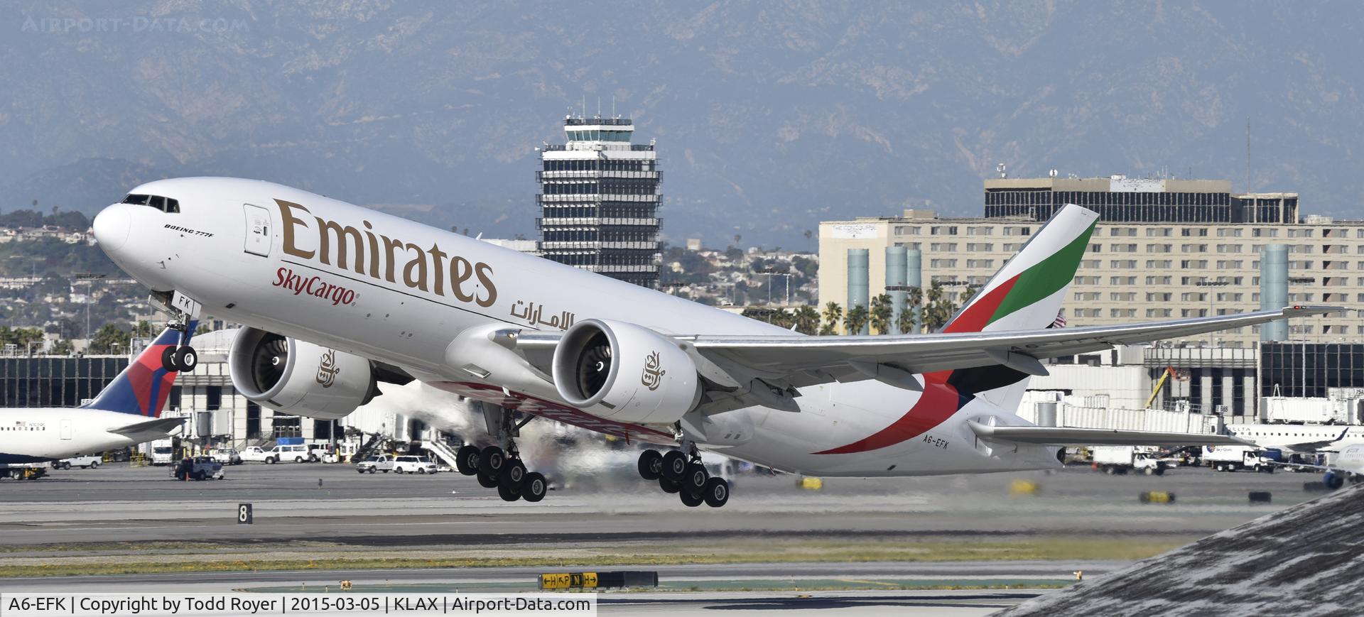 A6-EFK, 2013 Boeing 777-F1H C/N 35611, Departing LAX on 25R