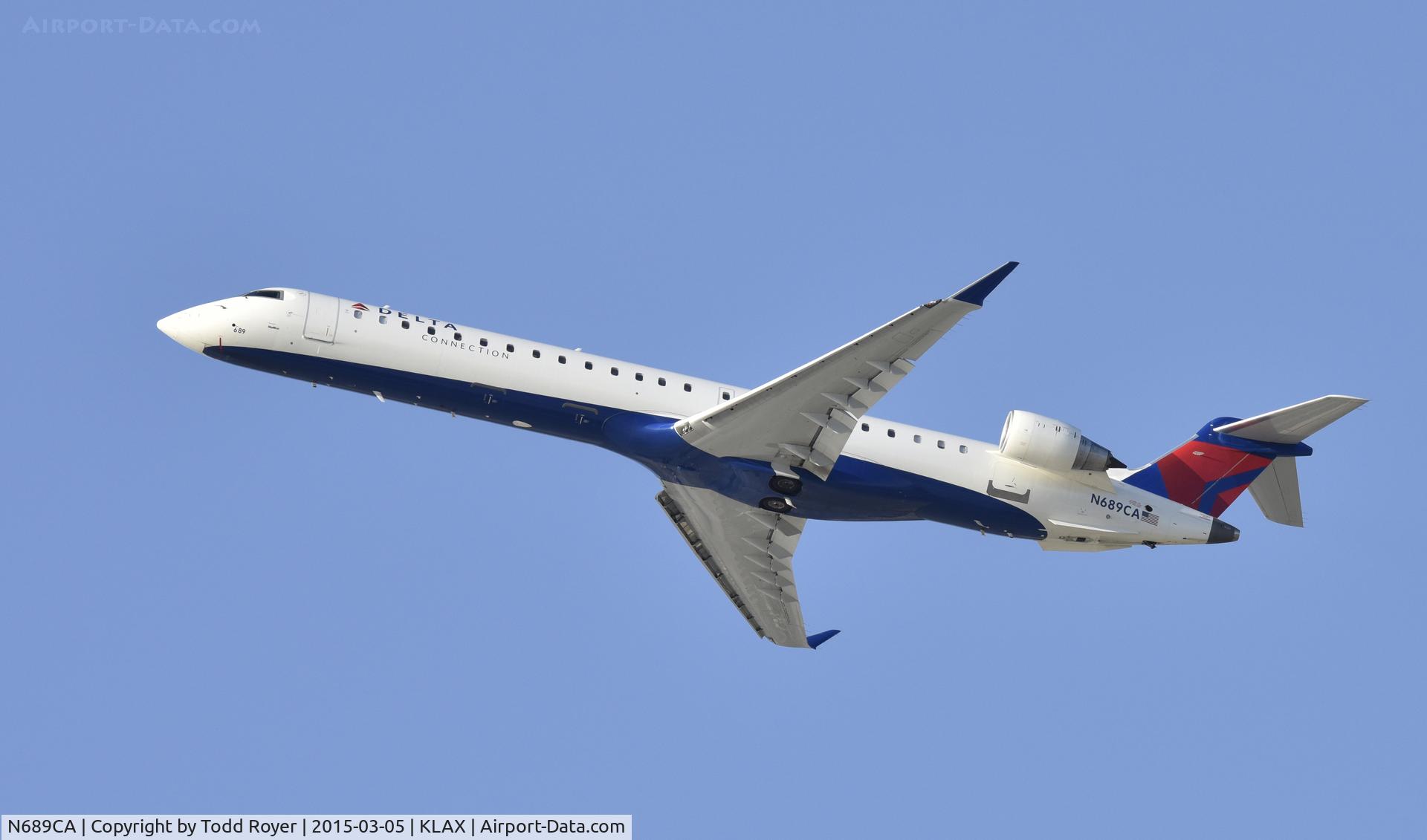 N689CA, 2007 Bombardier CRJ-900ER (CL-600-2D24) C/N 15133, Departing LAX on 25R