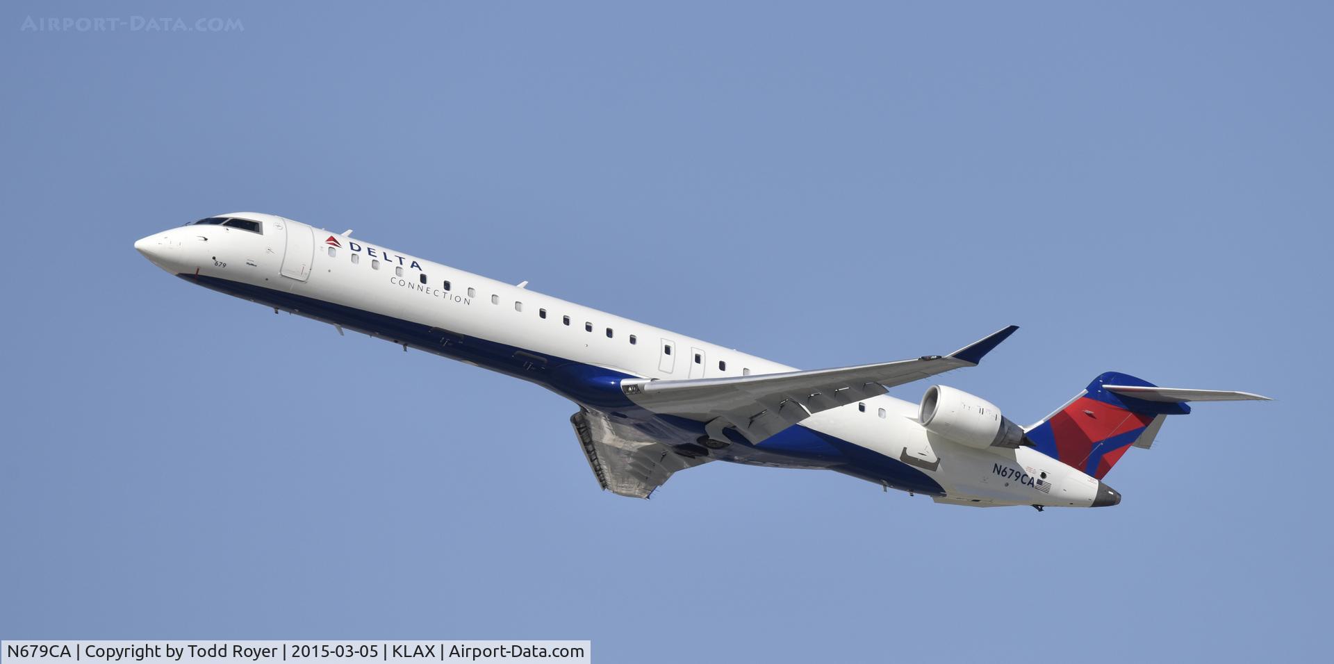 N679CA, 2007 Bombardier CRJ-900ER (CL-600-2D24) C/N 15132, Departing LAX on 25R