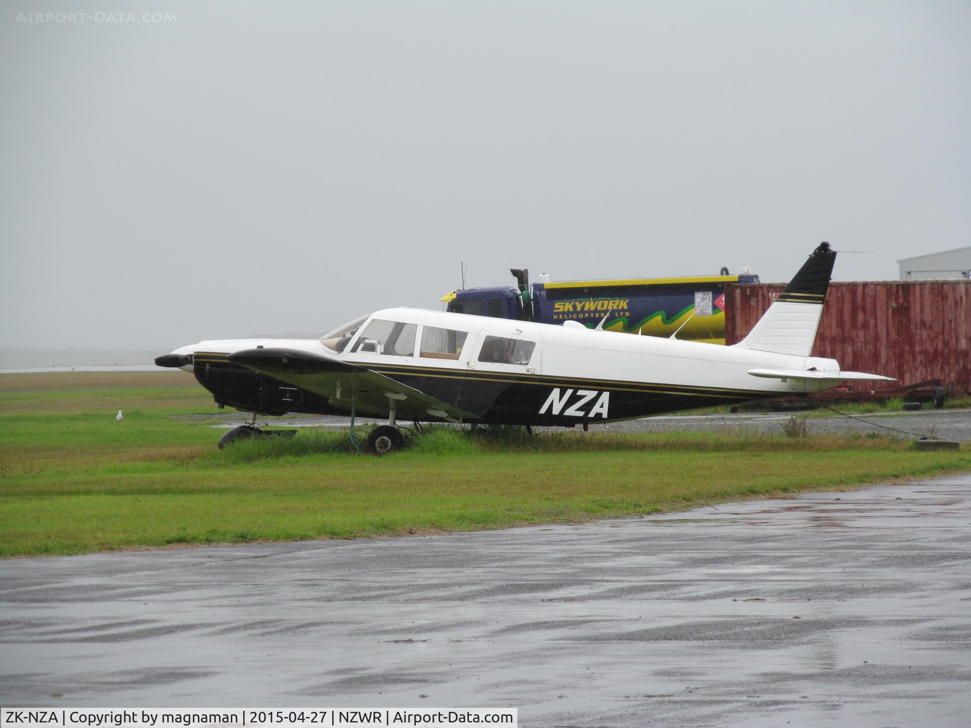 ZK-NZA, Piper PA-32-260 Cherokee Six C/N 32-402, Only aircraft to see at wet & windy Whangarei. Aircraft no longer on NZ register.