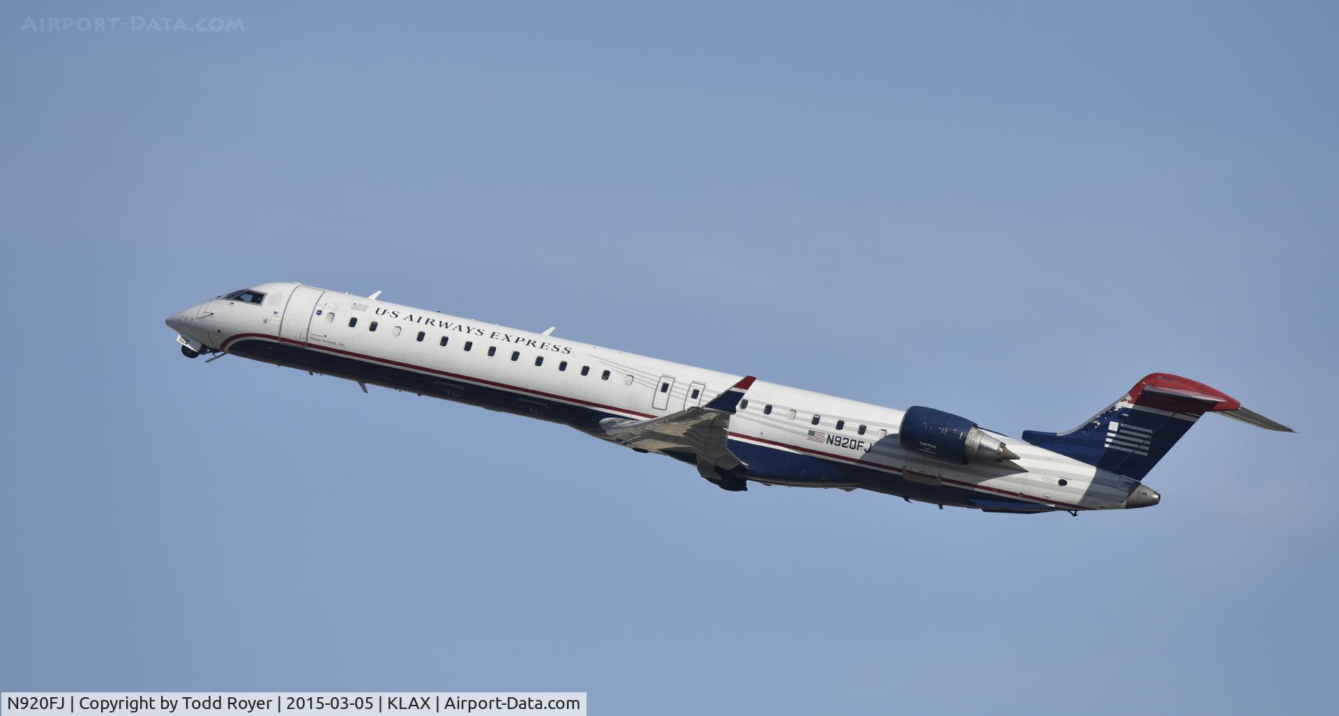 N920FJ, 2004 Bombardier CRJ-900ER (CL-600-2D24) C/N 15020, Departing LAX on 25R