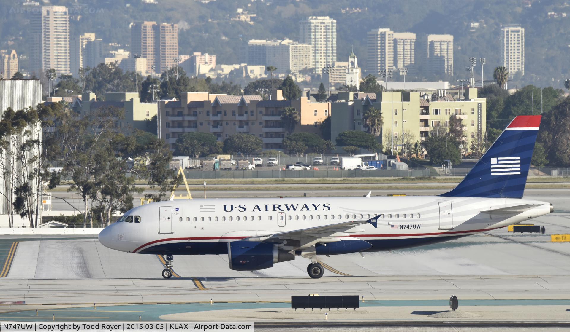 N747UW, 2000 Airbus A319-112 C/N 1301, Taxiing for departure at LAX