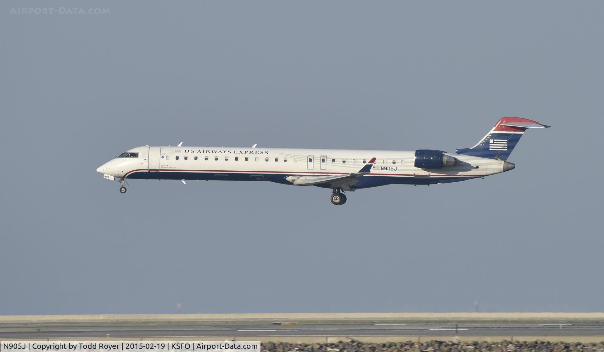 N905J, 2003 Bombardier CRJ-900 (CL-600-2D24) C/N 15005, Landing at SFO