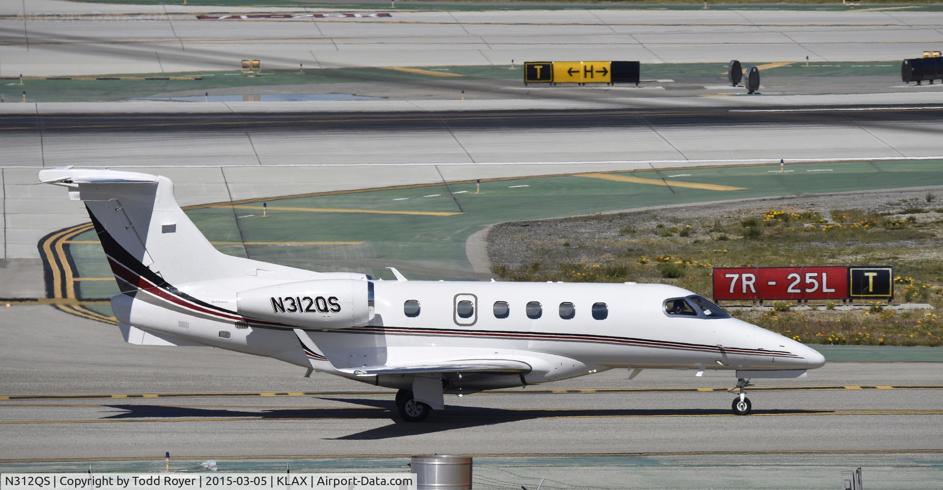 N312QS, 2013 Embraer EMB-505 Phenom 300 C/N 50500153, Taxiing to parking at LAX