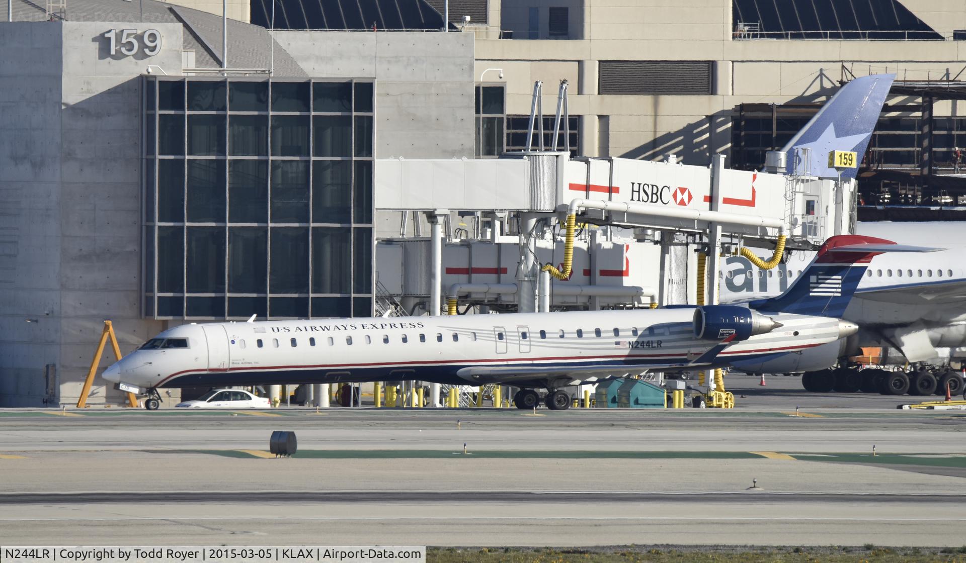 N244LR, 2009 Bombardier CRJ-900LR (CL-600-2D24) C/N 15233, Taxiing for departure at LAX