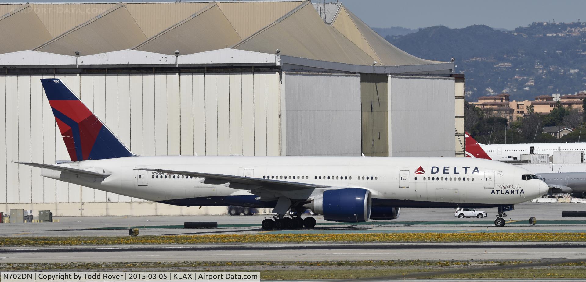 N702DN, 2008 Boeing 777-232/LR C/N 29741, Taxiing to gate at LAX