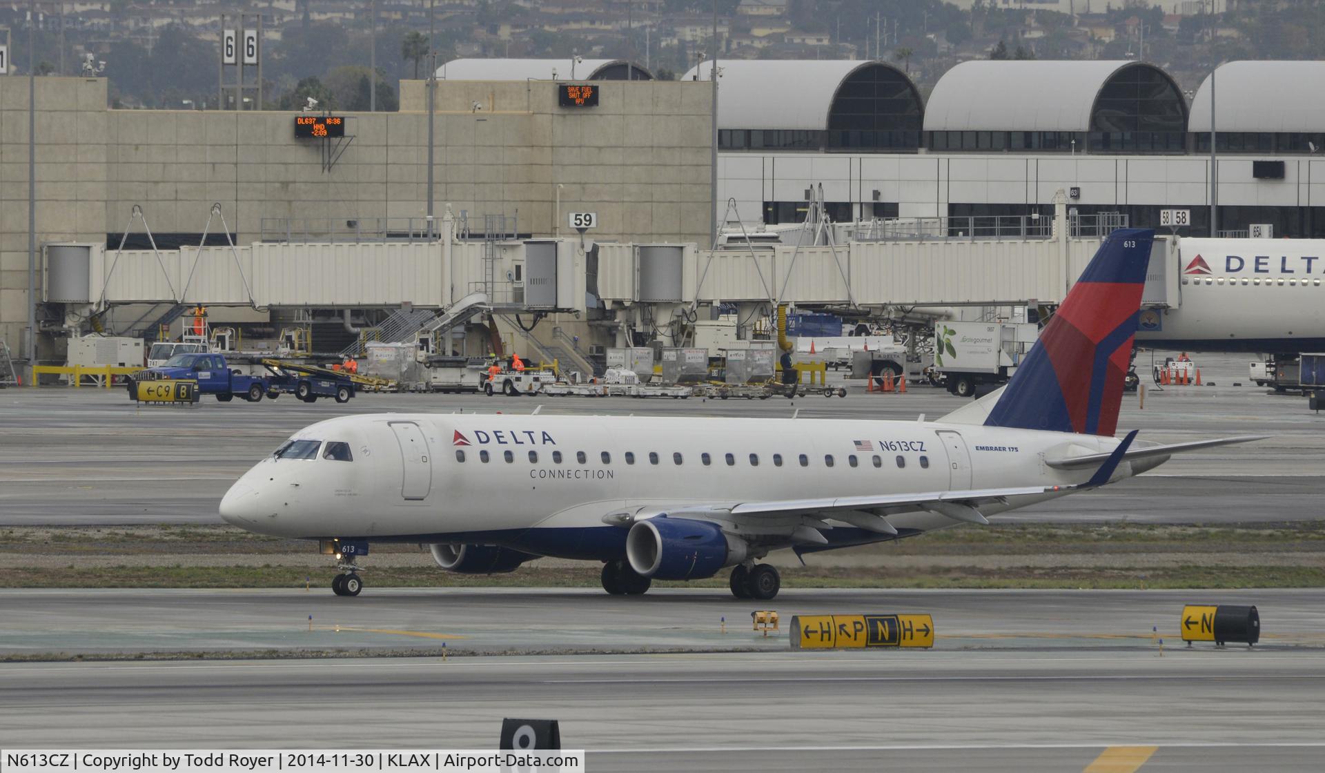 N613CZ, 2008 Embraer 175LR (ERJ-170-200LR) C/N 17000203, Taxiing to gate at LAX