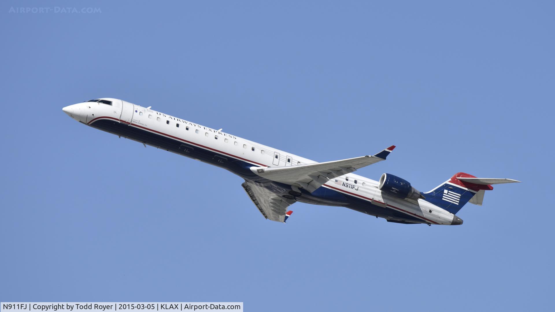 N911FJ, 2003 Bombardier CRJ-900ER (CL-600-2D24) C/N 15011, Departing LAX on 25R