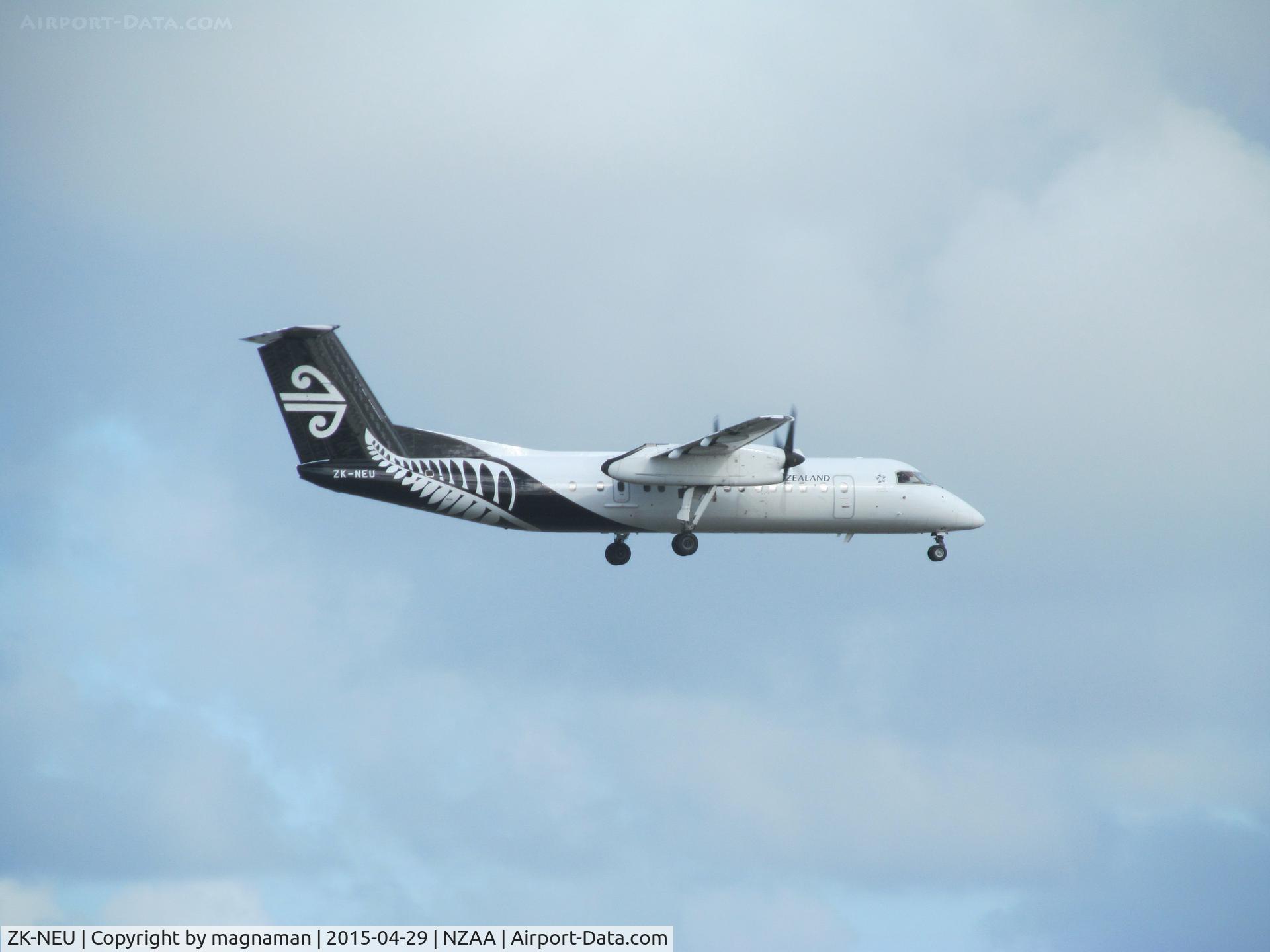ZK-NEU, 2007 De Havilland Canada DHC-8-311 Dash 8 C/N 647, taken through car windscreen - but not too fuzzy. On finals to AKL