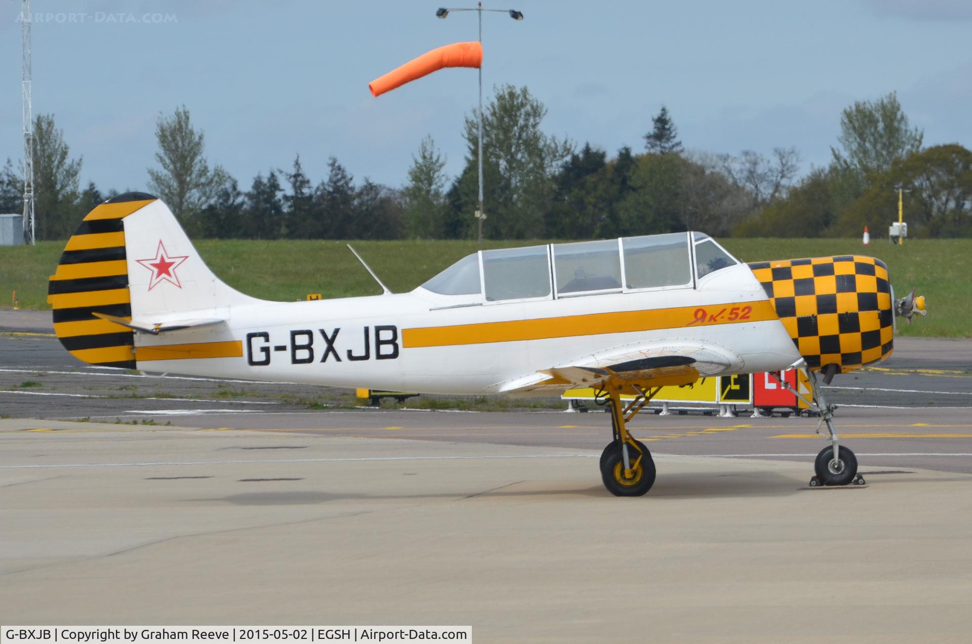 G-BXJB, 1987 Bacau Yak-52 C/N 877403, Parked at Norwich.