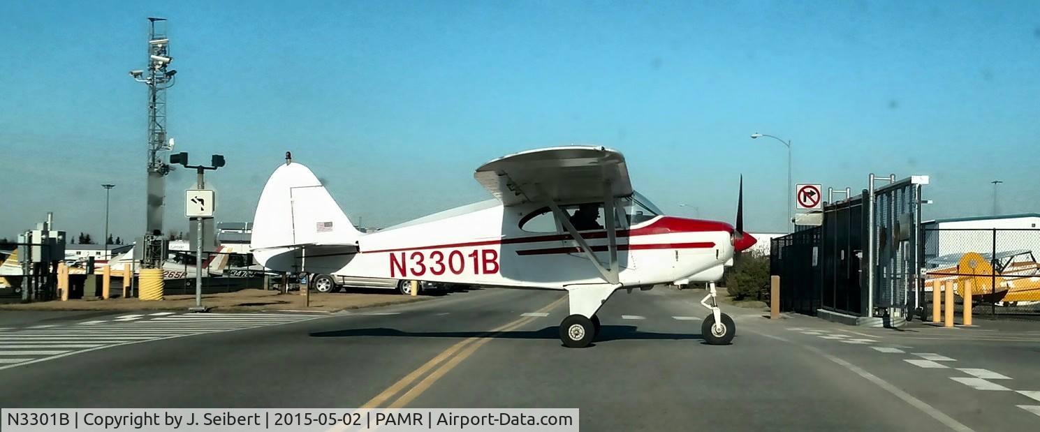 N3301B, 1954 Piper PA-22-135 Tri-Pacer C/N 22-2116, Taxiway Q at MRI on a beautiful May Saturday Morning